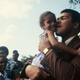 Muhammad Ali amidst Cruzan youth on his recent trip to the U.S. Virgin Islands. "The Champ" spent 3 days on both St. Croix and St. Thomas meeting island youngsters and donating his talents to aid five local charities: Boy Scouts, Girl Scouts, Special Olympics, Queen Louise Home for Children and Camp Arawak.
Getty Images